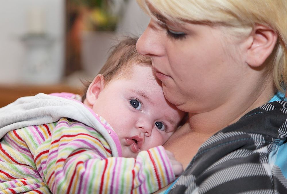Mutter mit Baby / aktion leben
